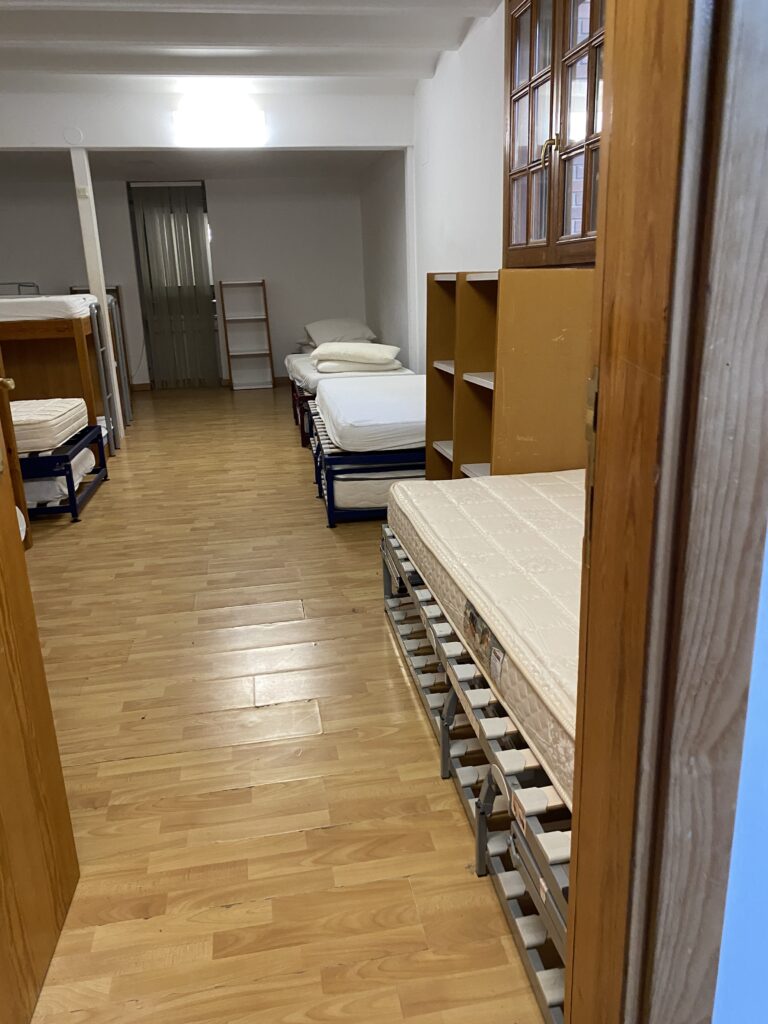 Habitació Espígol amb els llits individuals desplegats